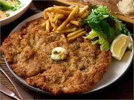 Шницель по-венски из свиной вырезки в панировке из брецеля 1081672